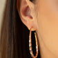 Twisted Edge - Rose Gold Hoop